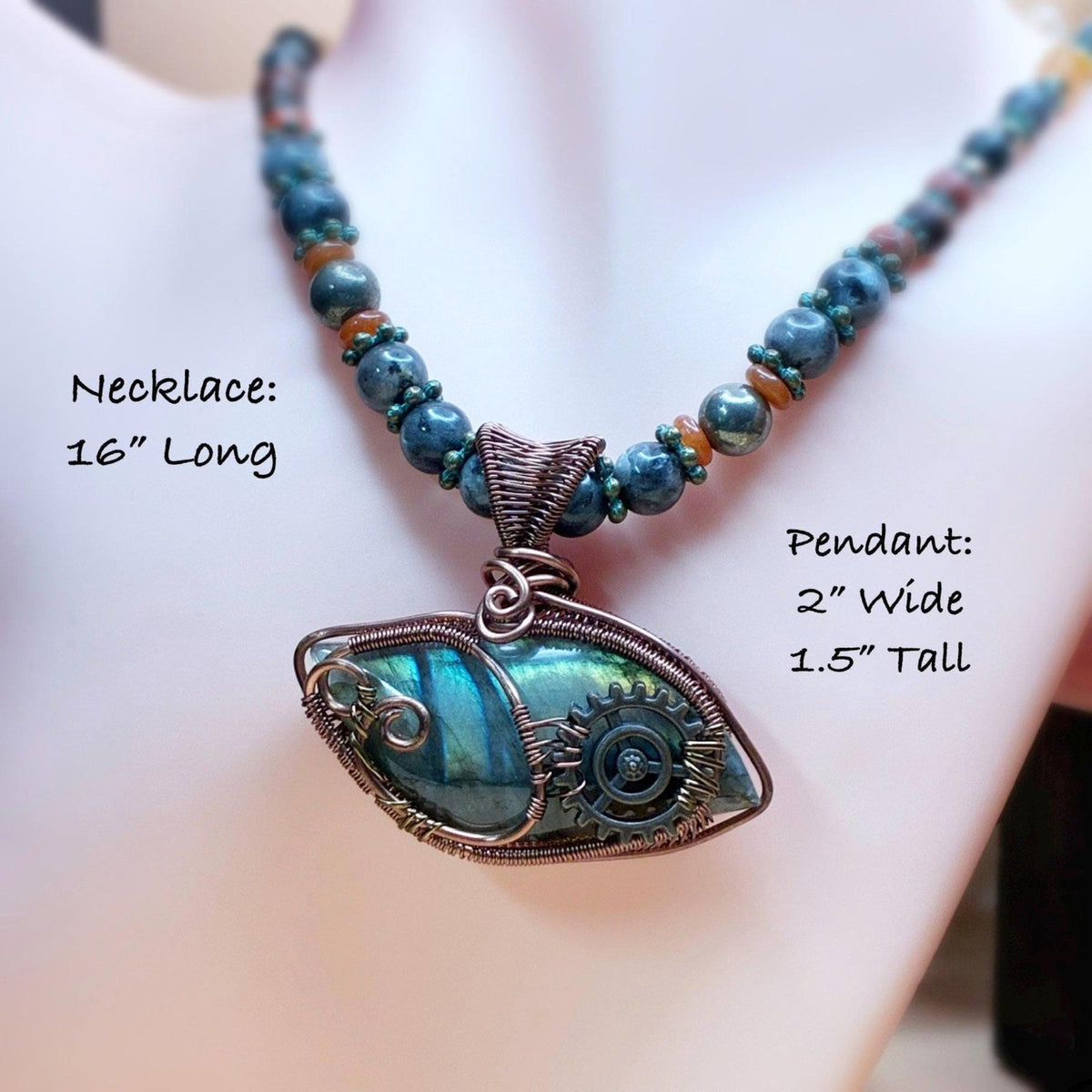 Picture shows the necklace laying on a bust with neck line and written dimensions of the necklace