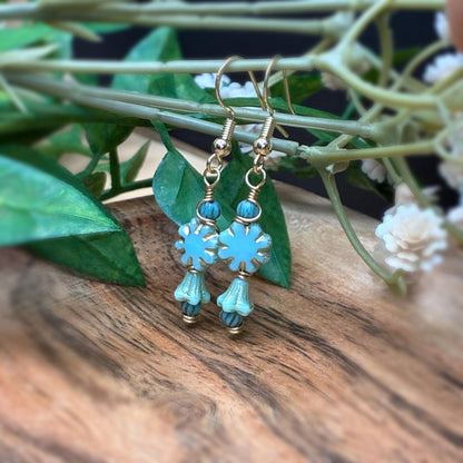 Turquoise blue florals wire wrapped in gold tone earrings