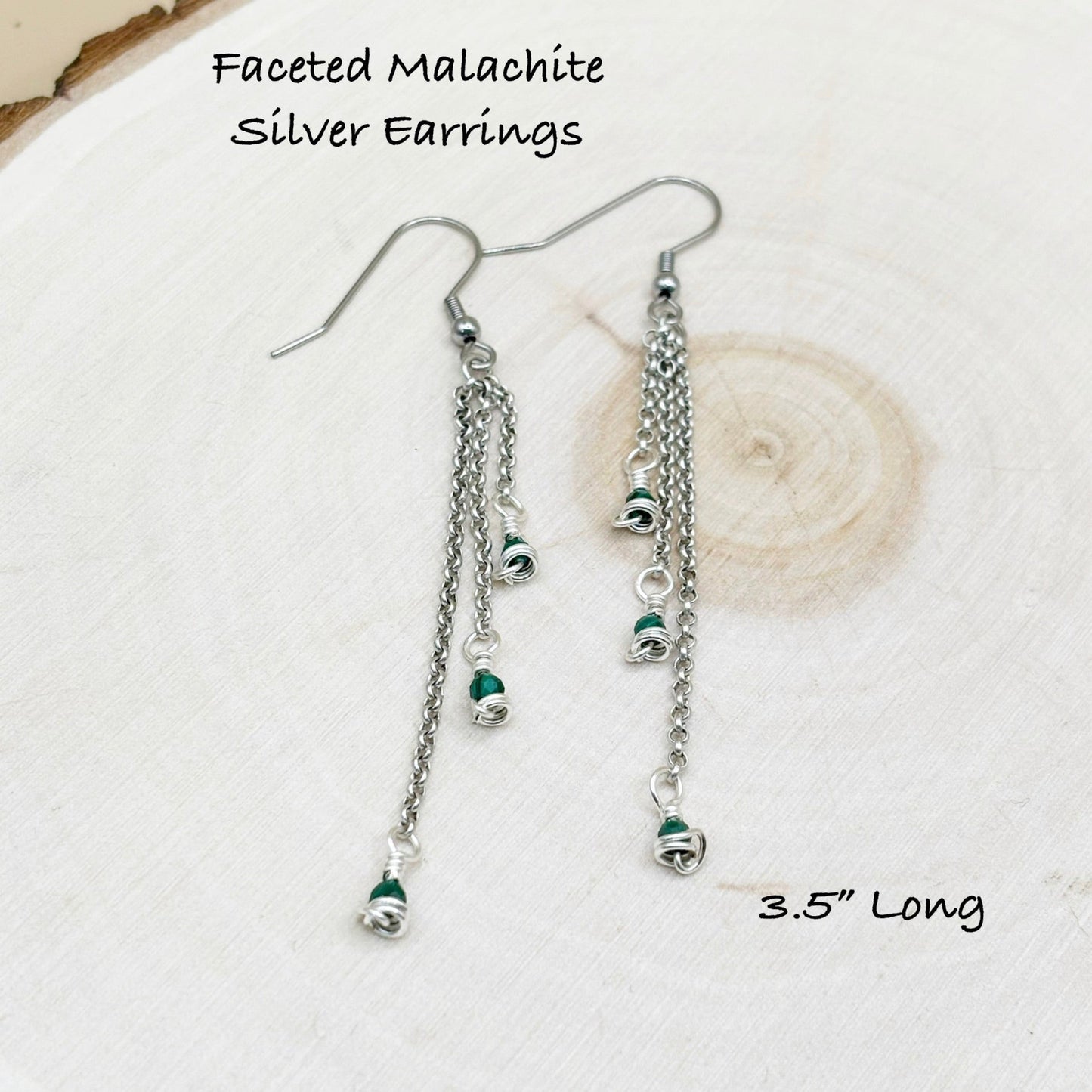 Faceted Malachite Silver Earrings on a white background