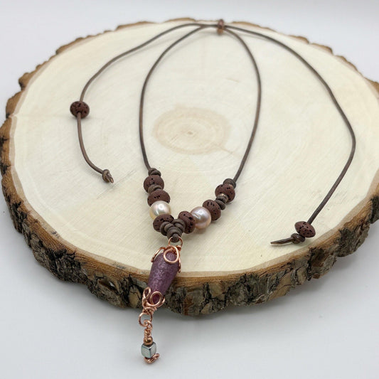 Necklace with beads on a wooden surface