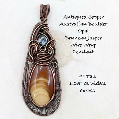 Antiqued copper wire wrap pendant with Australian Boulder Opal and Brunneau Jasper on a white background