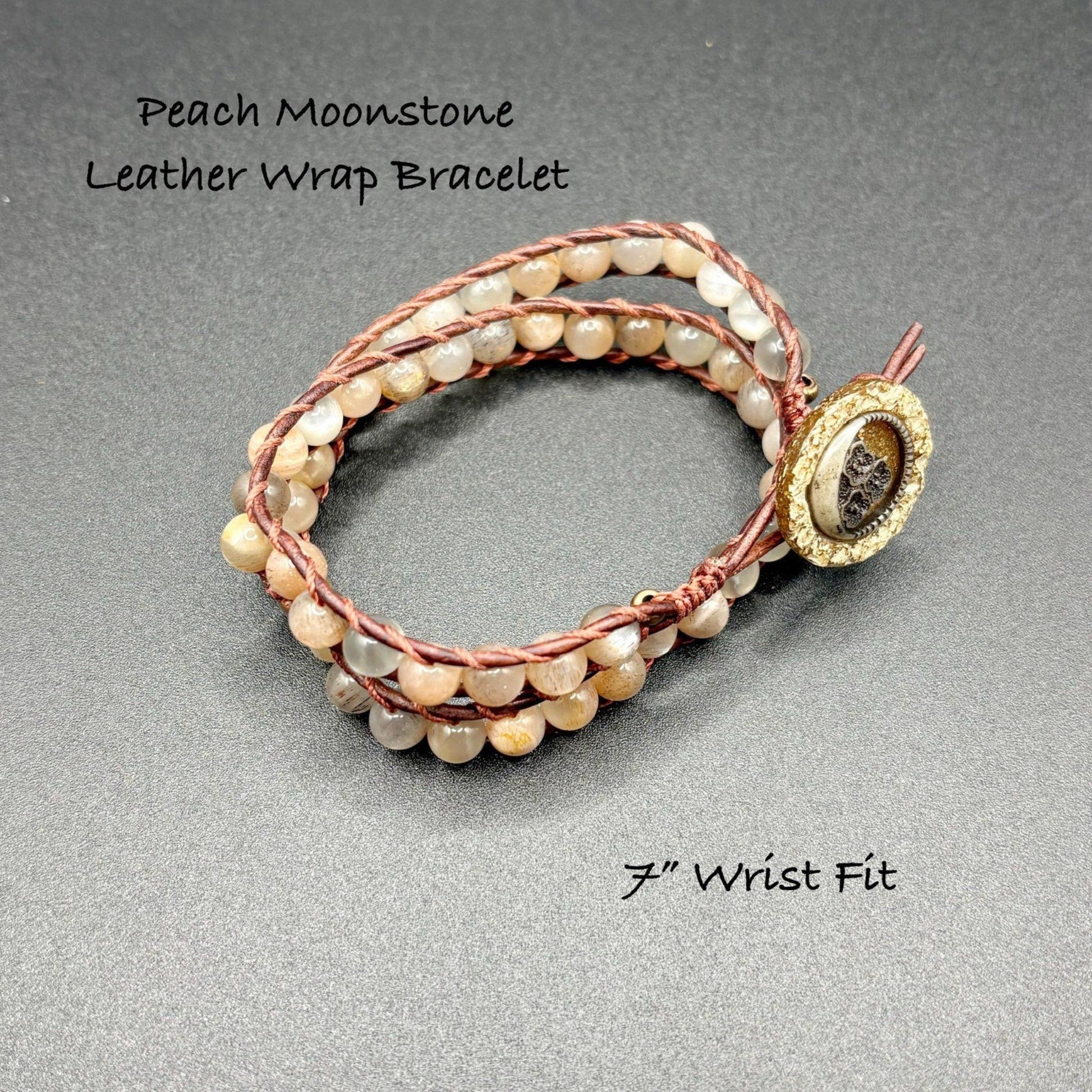 Peach Moonstone Leather Wrap Bracelet on a gray background