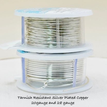 Two spools of tarnish-resistant silver-plated copper wire on a white background.