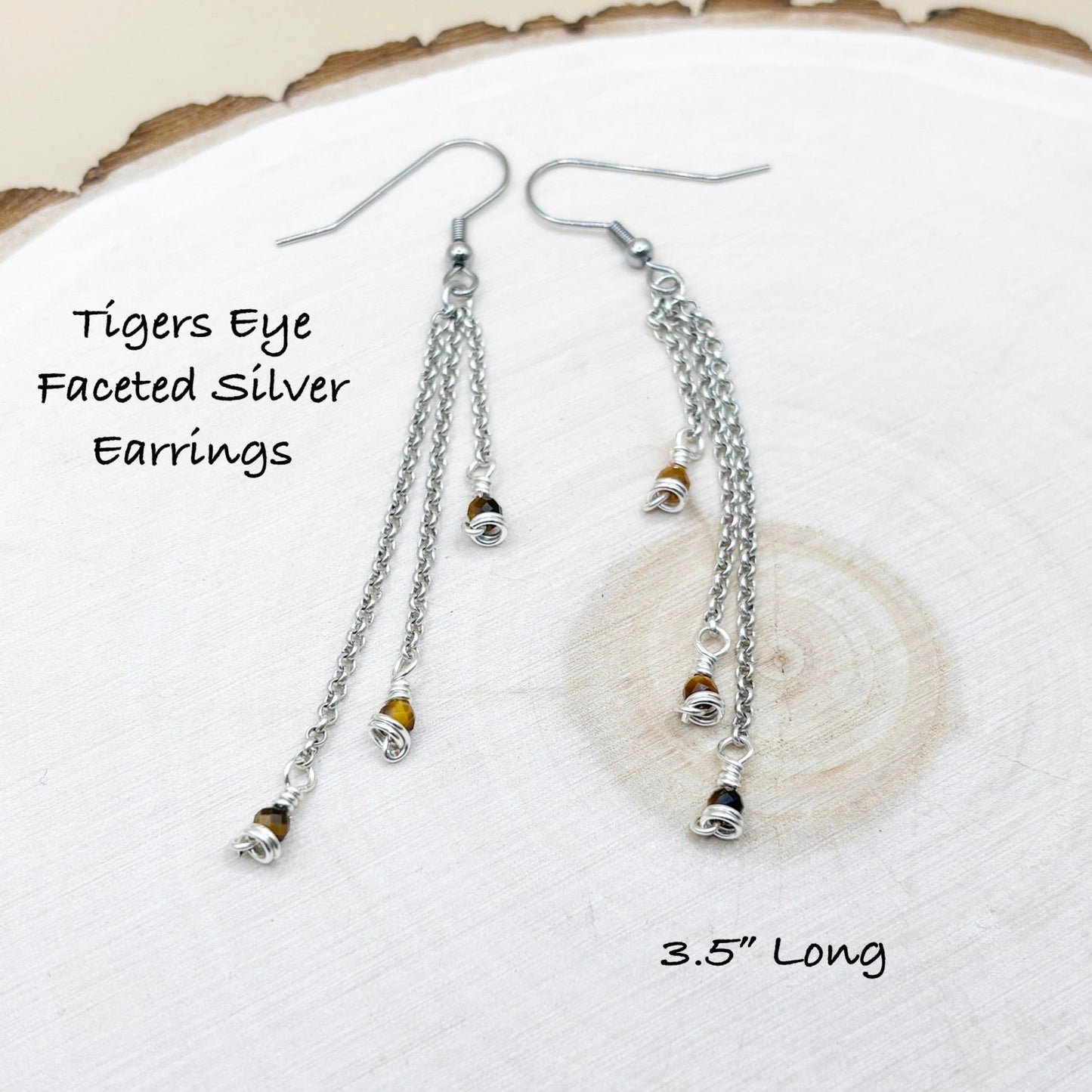 Tigers Eye Faceted Silver Earrings on a white background