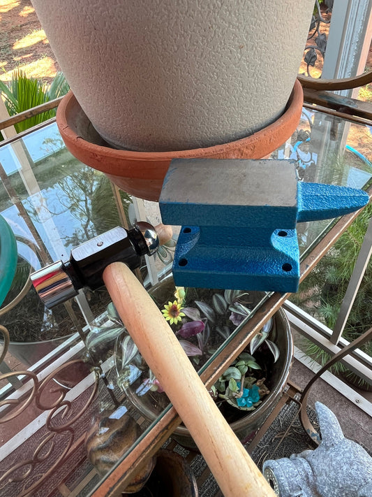 Jewelry anvil blue in color steel and ball been hammer with wooden handle-p