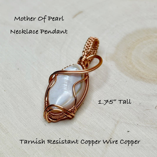 Mother of pearl necklace pendant with tarnish resistant copper wire on a light background