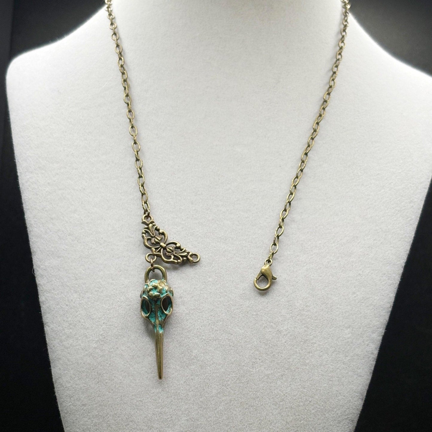 Necklace with a unique pendant on a mannequin bust