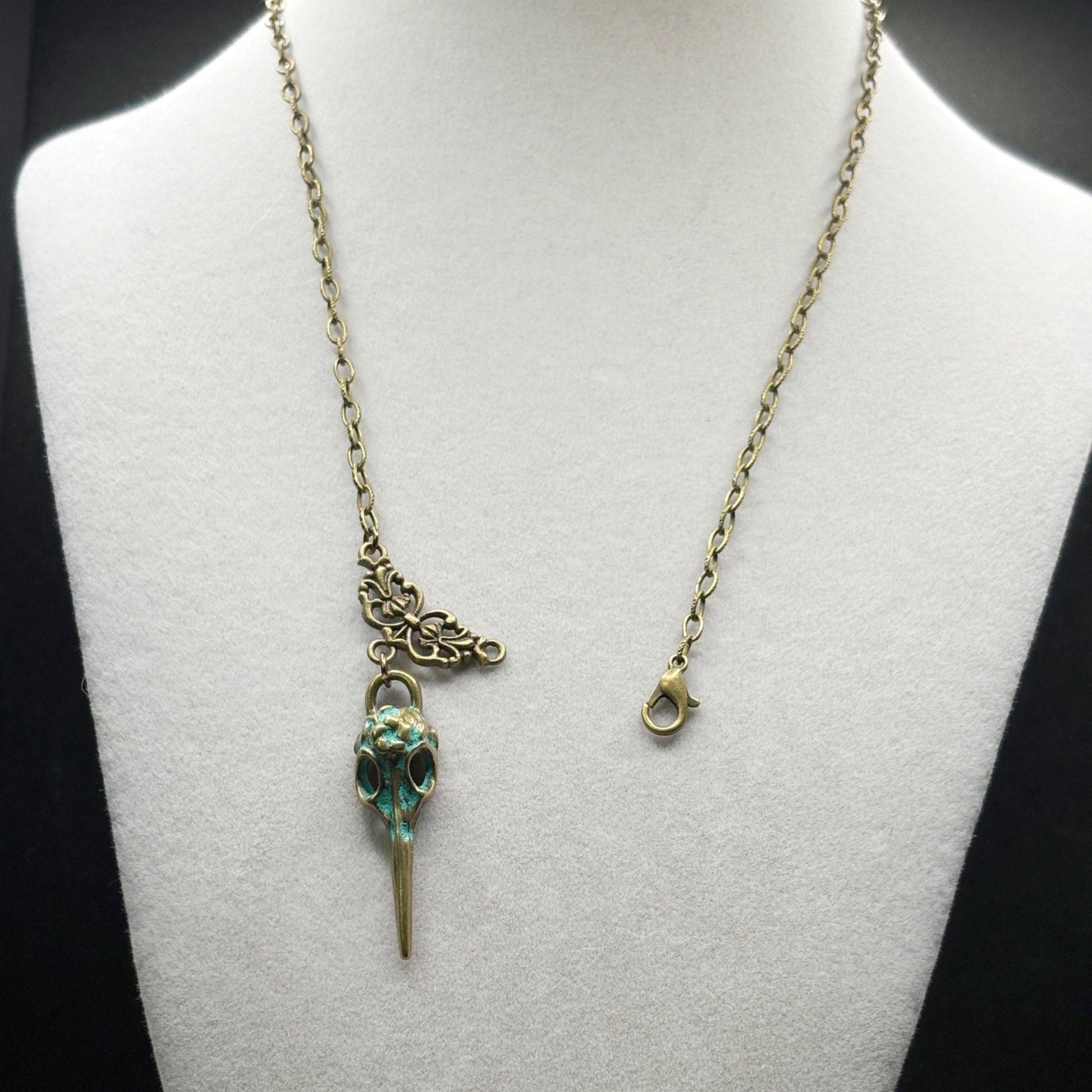 Necklace with a unique pendant on a mannequin bust