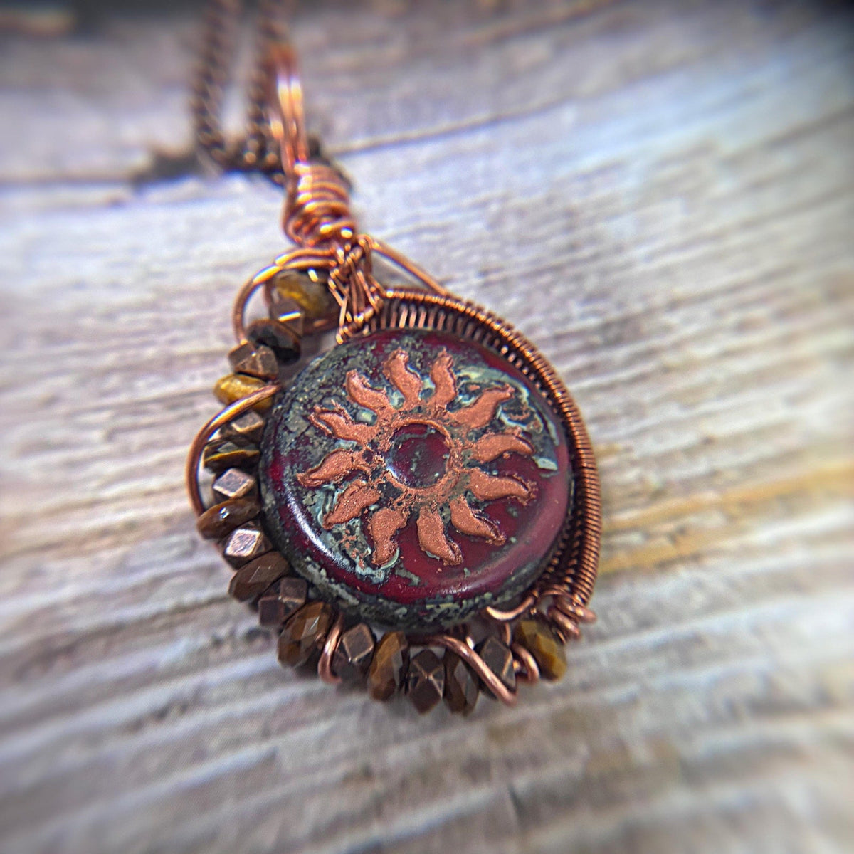 close up photo of copper wire wrap pendant