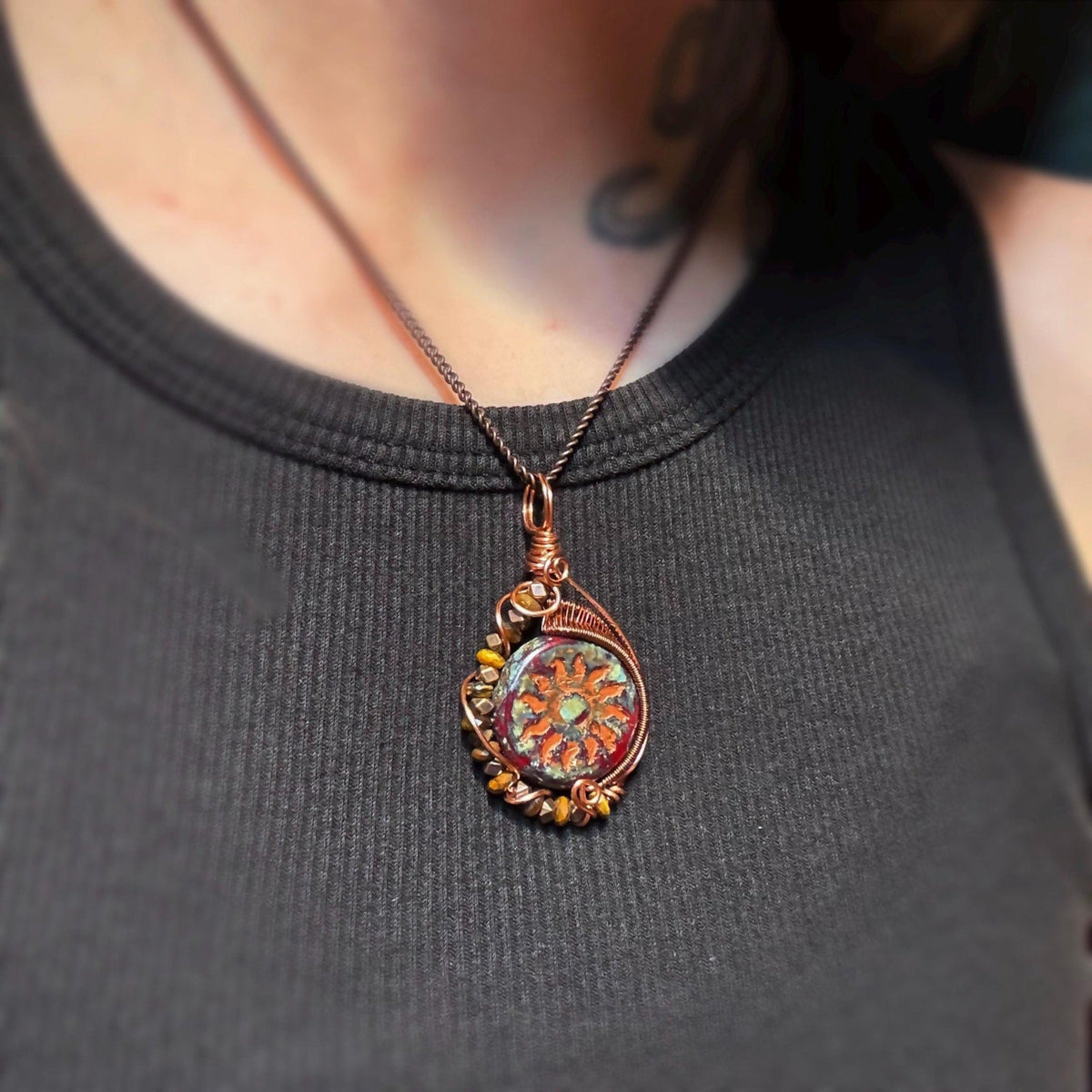 red pendant with tigers eye crystal
