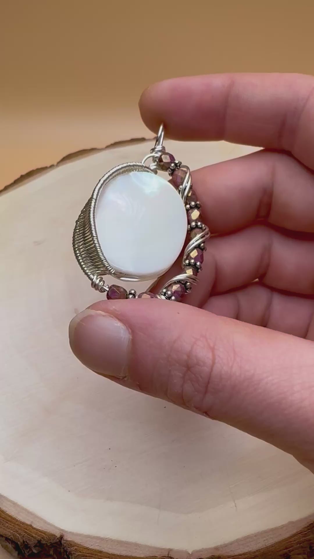 Video of mother of pearl wire wrap pendant