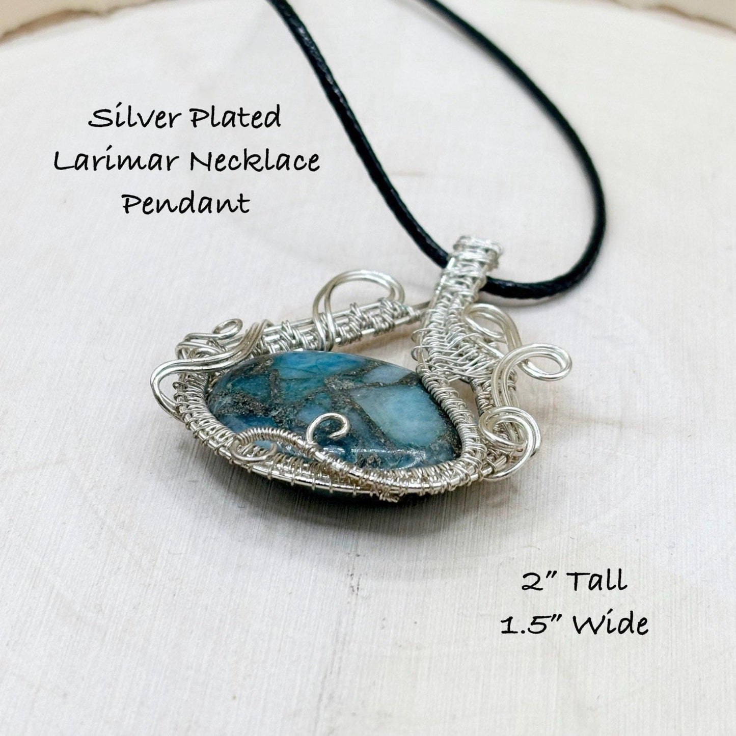 Silver-plated larimar necklace pendant on a white background
