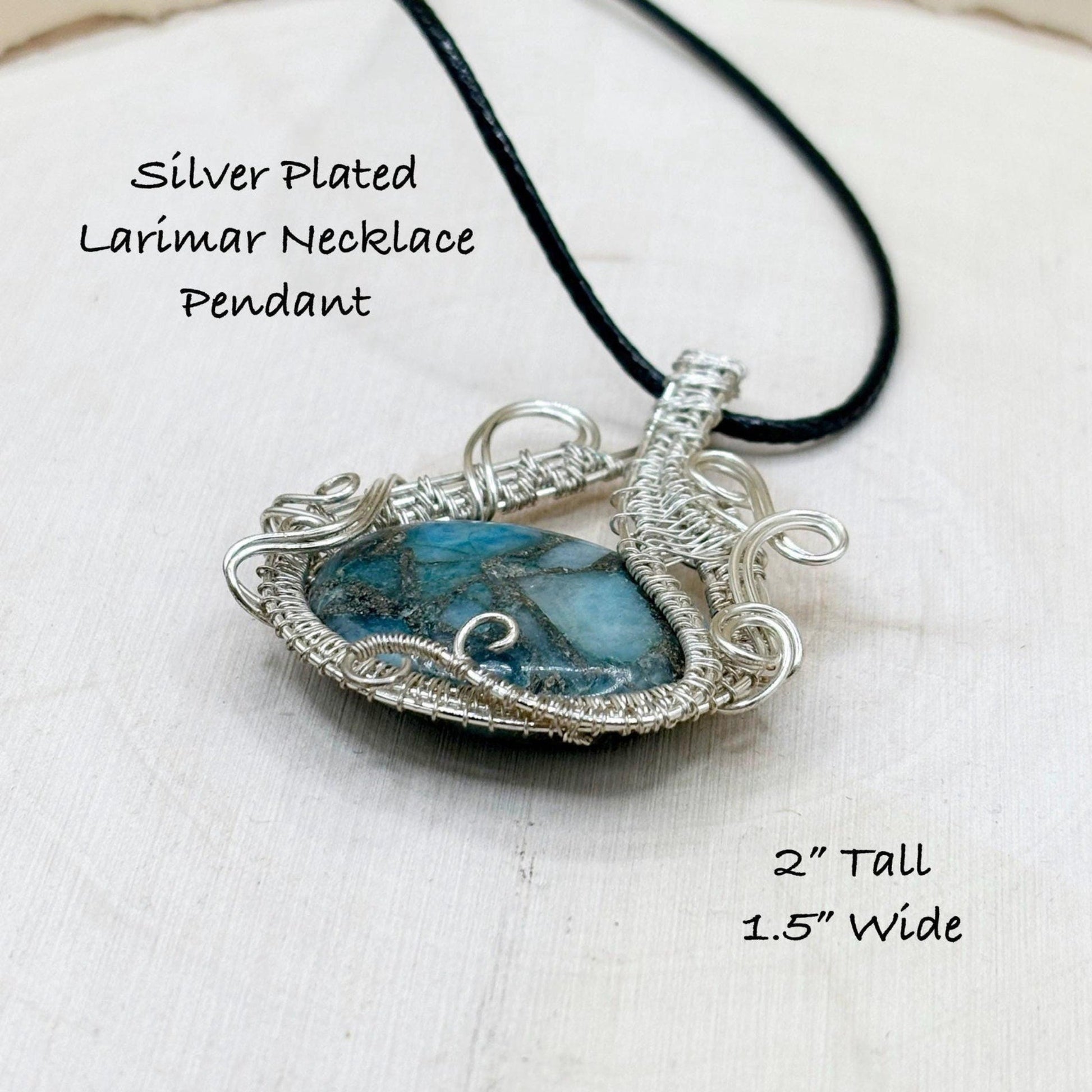 Silver-plated larimar necklace pendant on a white background